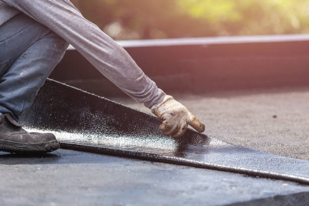 Professional Emergency Waterproofing technician working in Montague, MI
